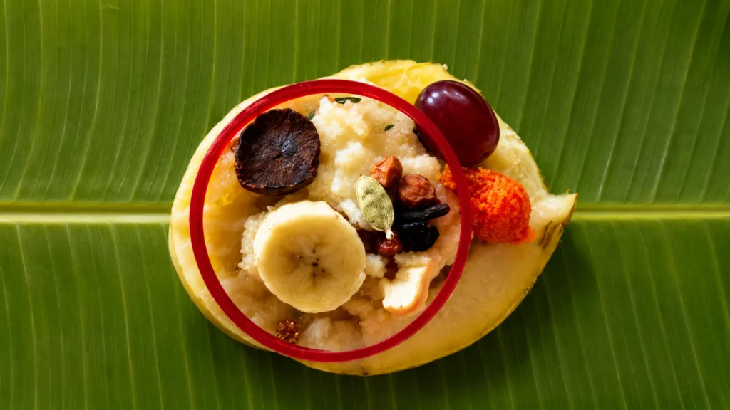 The Importance of Dhaar and Halwa Puri in Devi Puja banana prasadam with fruits and spices on banana leaf